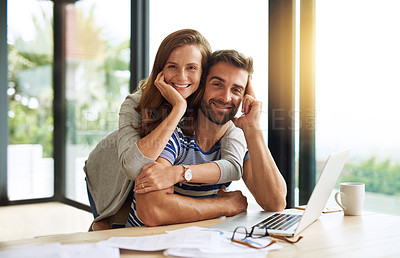 Buy stock photo Cropped portrait of an affectionate young couple working on their household budget