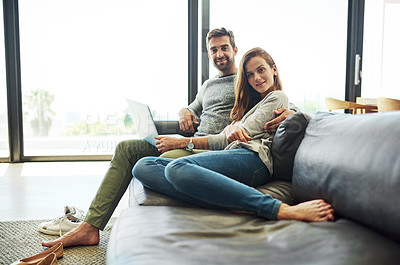 Buy stock photo Portrait, happy couple and laptop on sofa in home for relax, internet or connection for love together. Man, woman and smile by computer for social media, news and streaming on website in living room