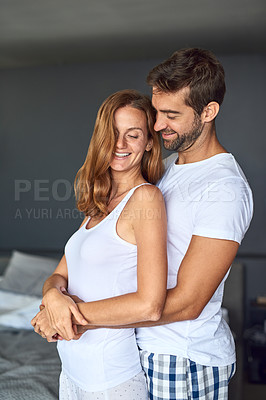 Buy stock photo Happy couple, hug and bedroom for love in relationship, romance and morning together in home. People, pyjamas and embrace for trust or support in marriage, security and relax on weekend for bonding