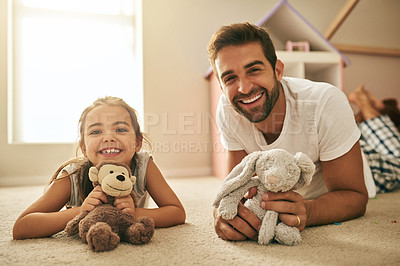 Buy stock photo Portrait of a handsome young man and his daughter playing with stuffed toys on her bedroom floor