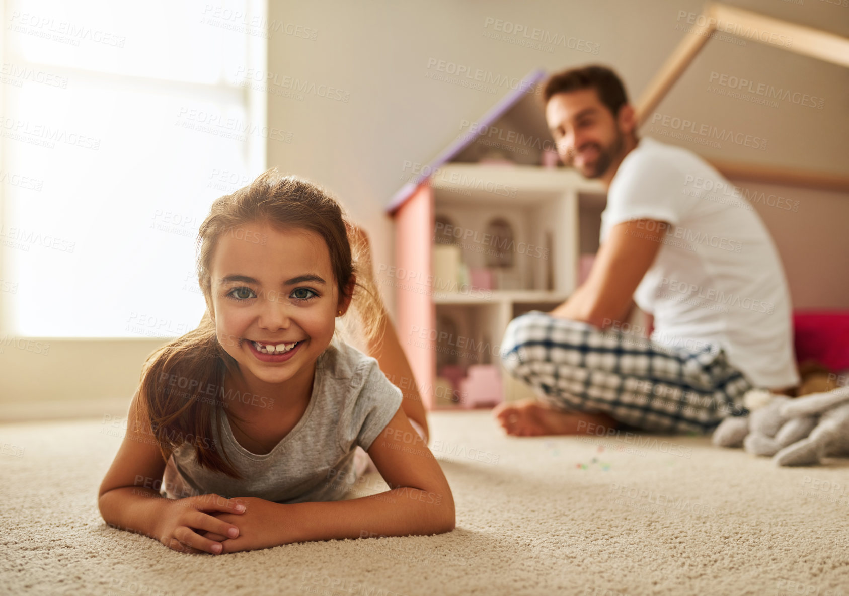 Buy stock photo Girl, portrait and smile in family home or bedroom, happiness and child development or father in apartment. Relaxing, floor and relationship for weekend break, bonding and connection with parent care