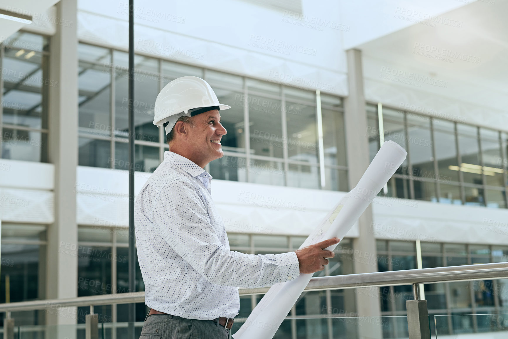 Buy stock photo Blueprint, architect and happy man planning at construction site for office renovation, development or maintenance. Thinking, engineer or vision for building project, idea or problem solving at work