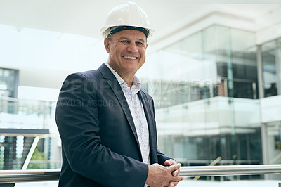 Buy stock photo Mature, businessman and happy architect with hardhat for project management, property planning and confidence. Contractor, professional person and smile for engineering and building planner in office