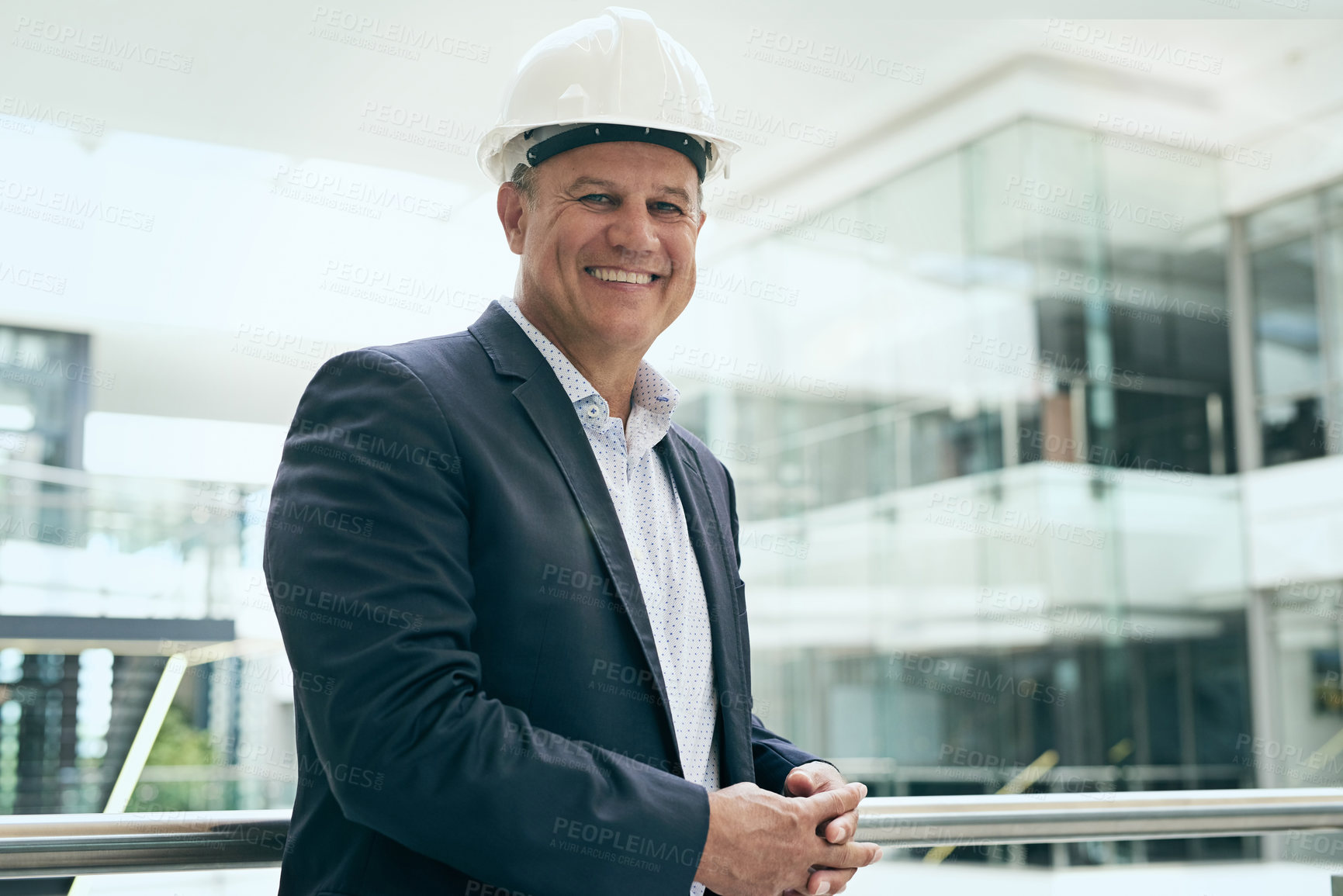 Buy stock photo Mature, businessman and happy architect with hardhat for project management, property planning and confidence. Contractor, professional person and smile for engineering and building planner in office