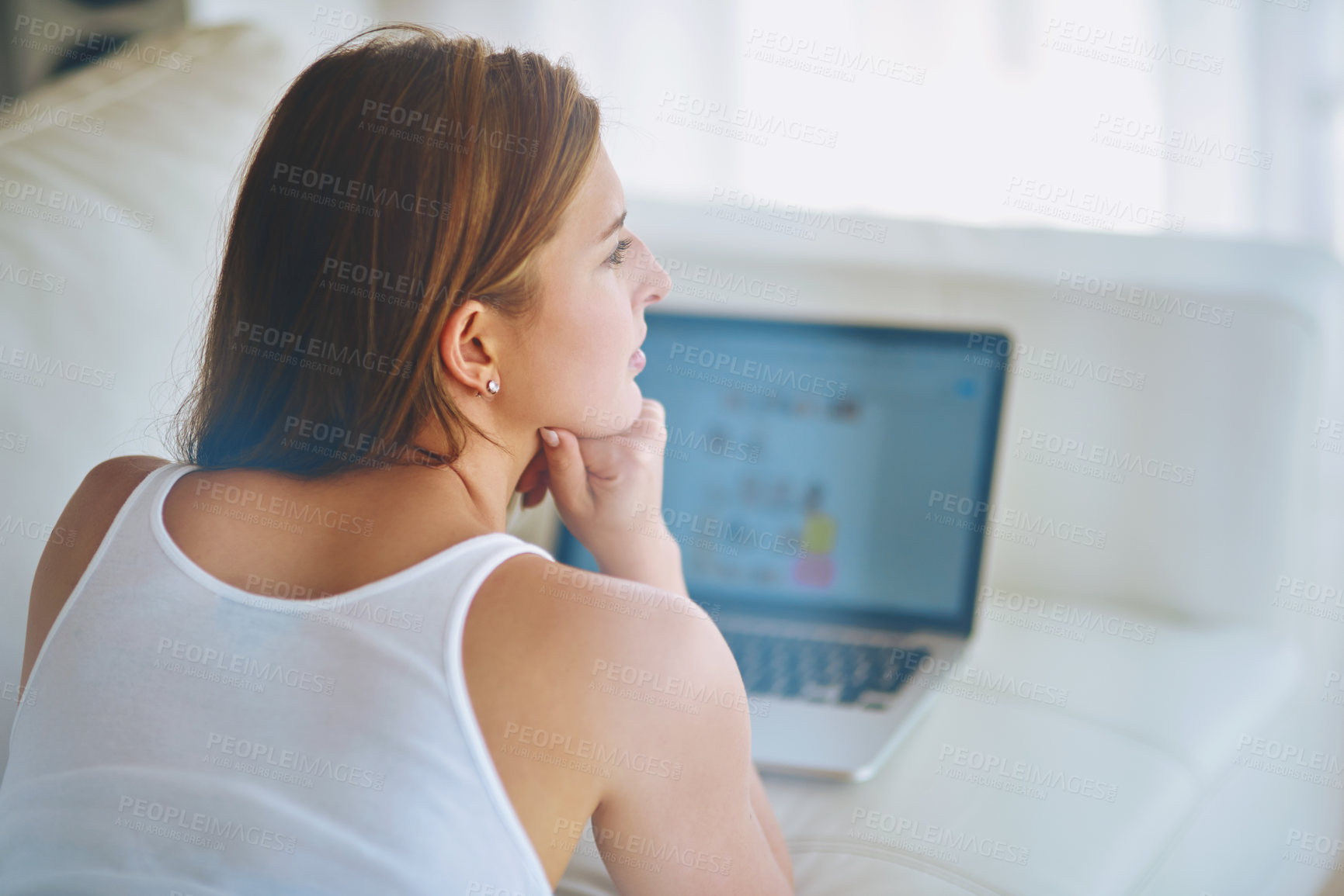 Buy stock photo Laptop, relax and thinking with woman on sofa in living room of home for online shopping or research. Computer, ecommerce and idea with serious person in apartment as customer for retail browsing