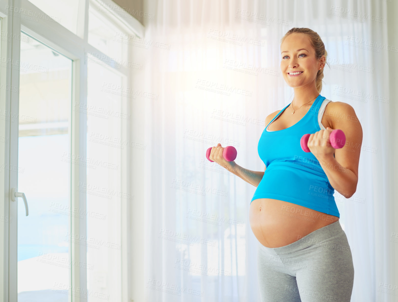 Buy stock photo Weights, health and pregnant woman with arm exercise for strength, fitness and wellness in home. Dumbbell equipment, pregnancy and female person with maternity workout for prenatal care at house.