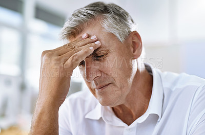 Buy stock photo Migraine, stress and senior businessman in the office with healthcare problem or medical emergency. Medical issue, burnout and sick professional corporate manager in pain with a headache in workplace