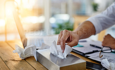 Buy stock photo Cropped shot of an unrecognizable man taking a tissue for his nose in the office