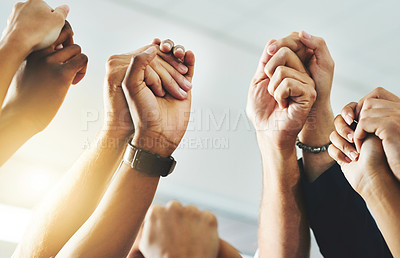 Buy stock photo Teamwork, community and support with fists of power, protest hands joined together solidarity. Closeup of a group of people working together to achieve success. Teamwork, collaboration and unity