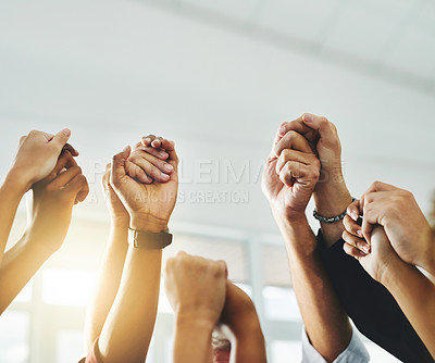 Buy stock photo People raising their arms hands and holding each other's hands to protest together gesture as a team and group in unity. Men and women showing teamwork, support and community close up with copy space