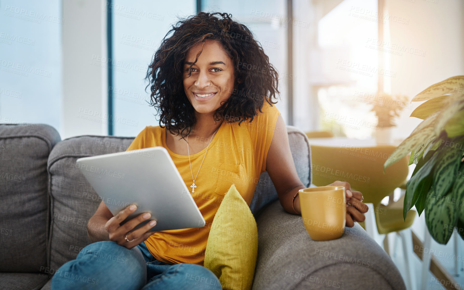 Buy stock photo Coffee, tablet and portrait of woman on sofa in home reading ebook on weekend in living room. Happy, relax and female person with cappuccino and digital technology for online novel review blog.