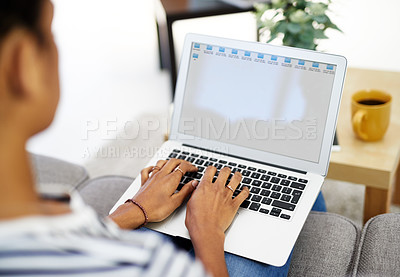 Buy stock photo Shot of an unrecognizable woman working from home