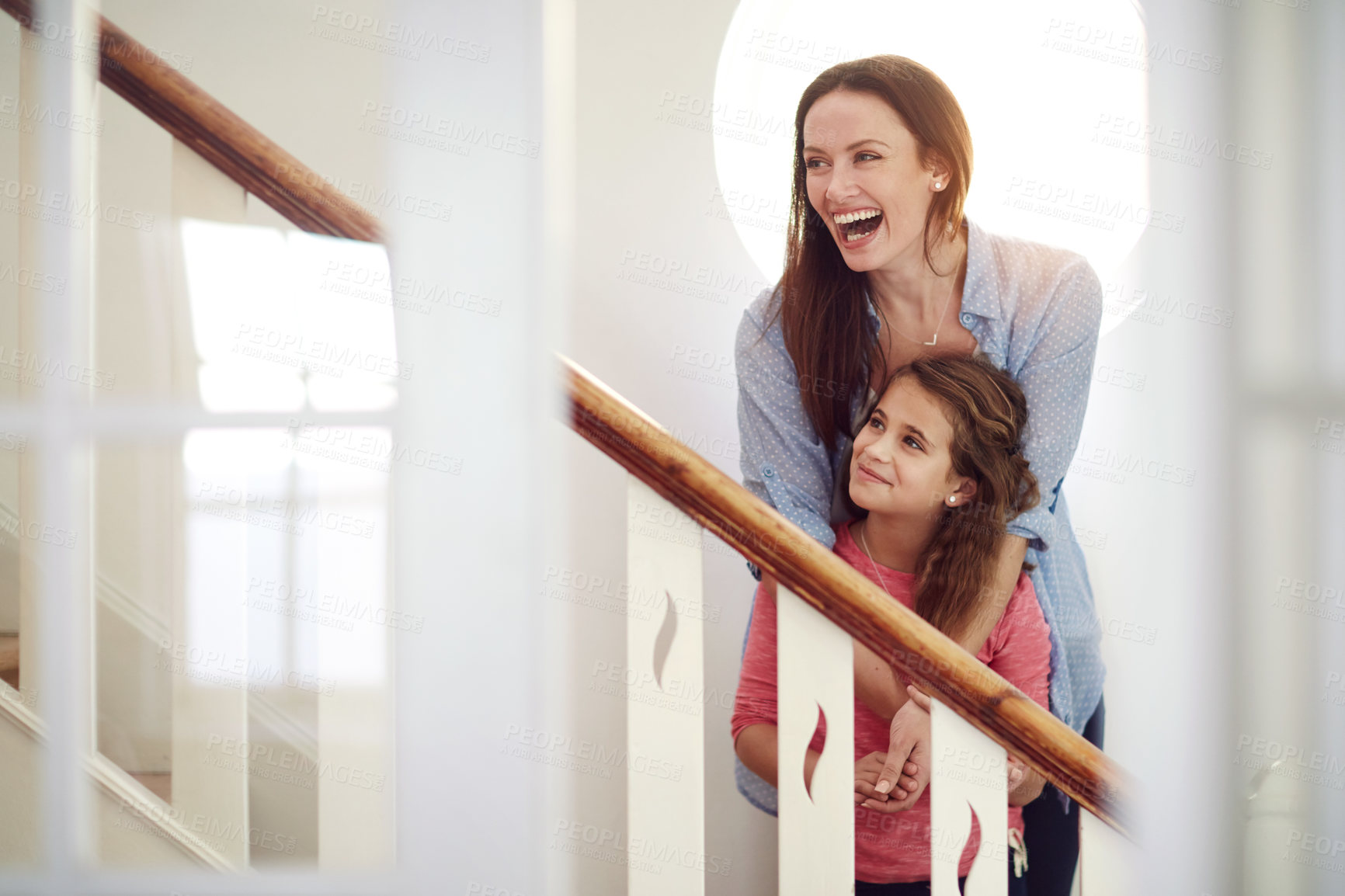 Buy stock photo Shot of a happy young mother and daughter enjoying their time together