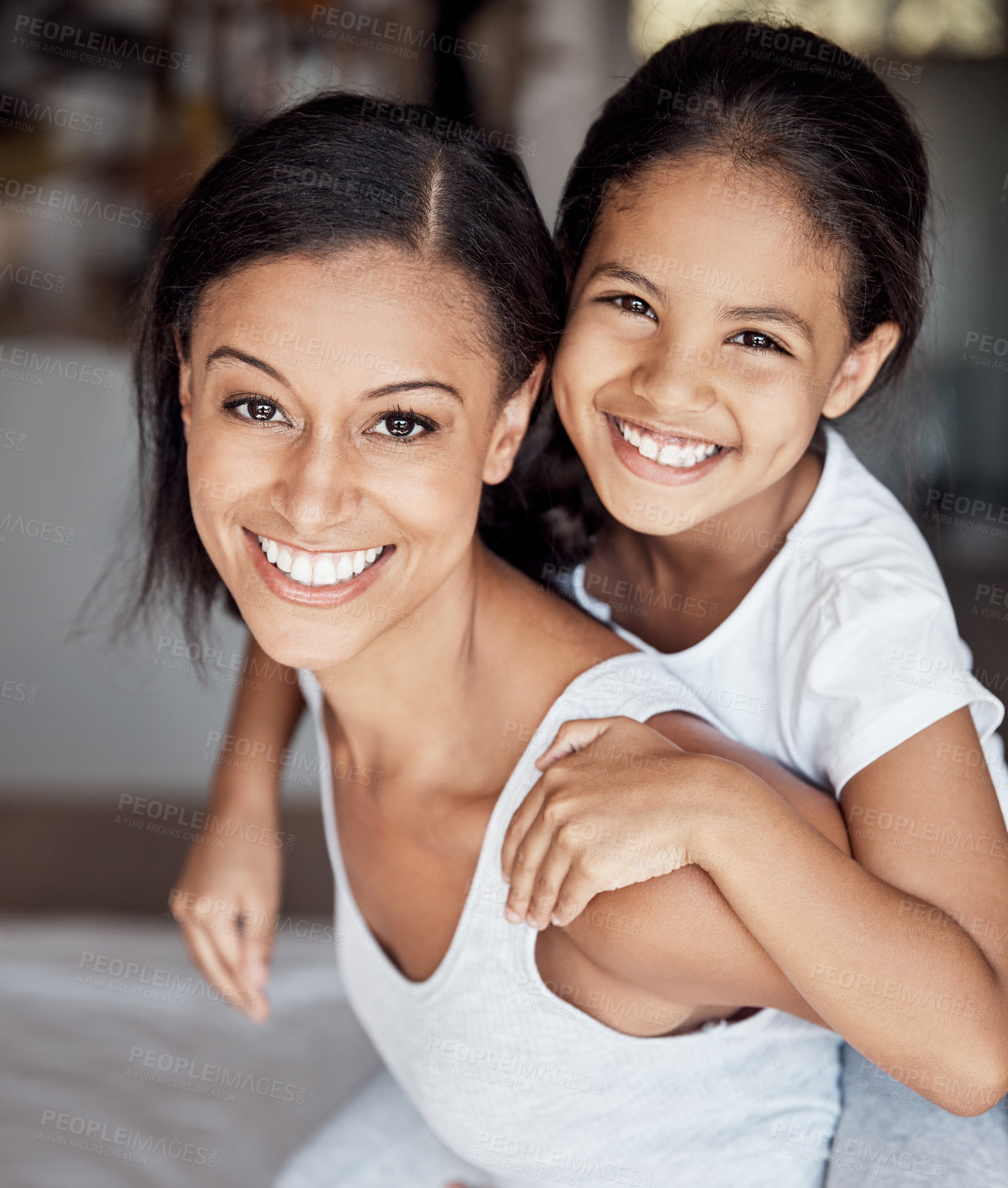 Buy stock photo Portrait of a mother and her little daughter bonding together at home