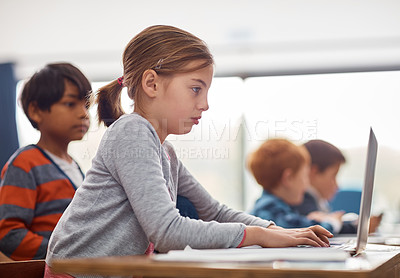 Buy stock photo Laptop, kids and girl in classroom for online project with growth, child development and web education. Typing, elearning and school students with exam course for research, notes and children at desk