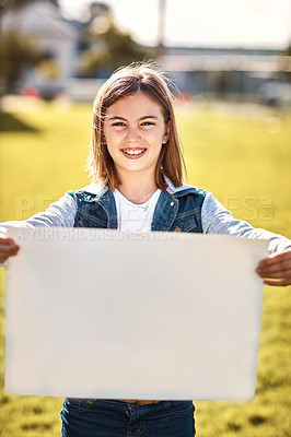 Buy stock photo Portrait of a little girl holding a blank board outdoors