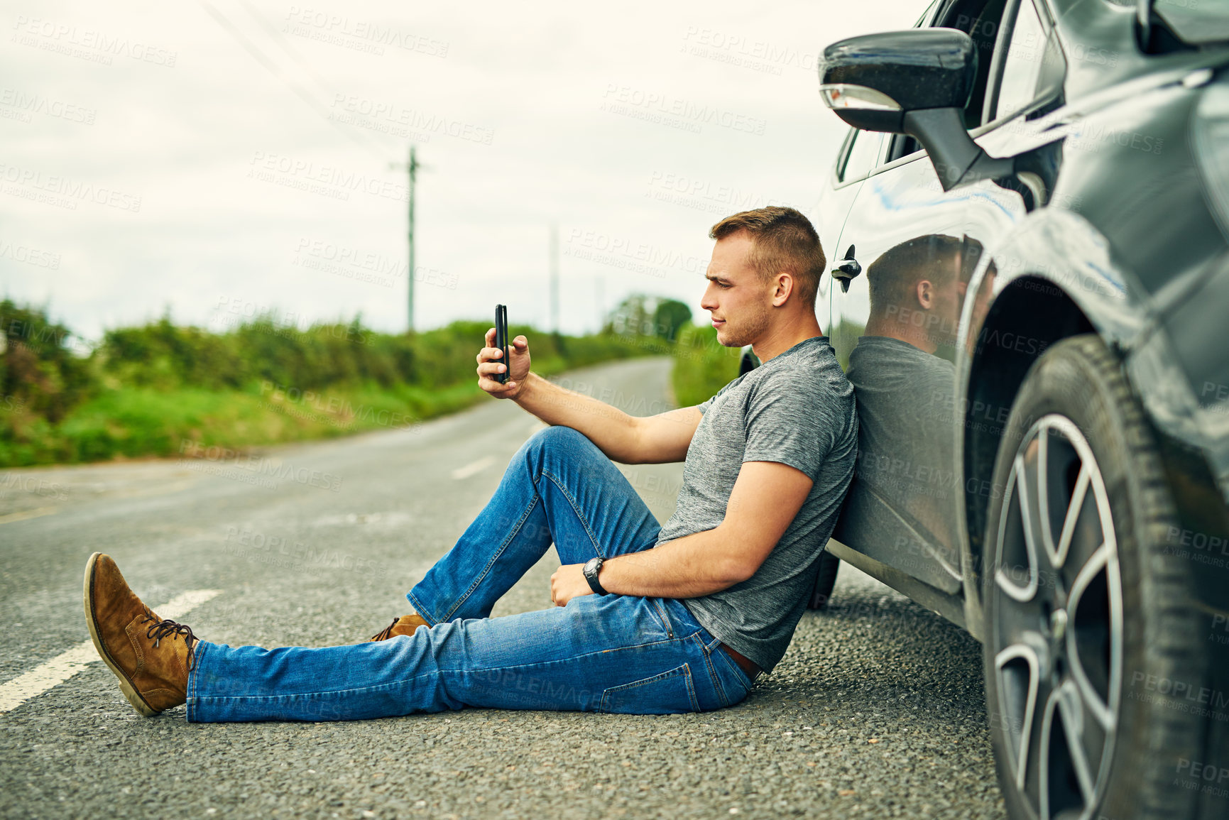 Buy stock photo Road, man and car breakdown on smartphone with internet connection for help or contact mechanic. male person, disappointed and sad at vehicle with texting insurance company for assistance in Germany