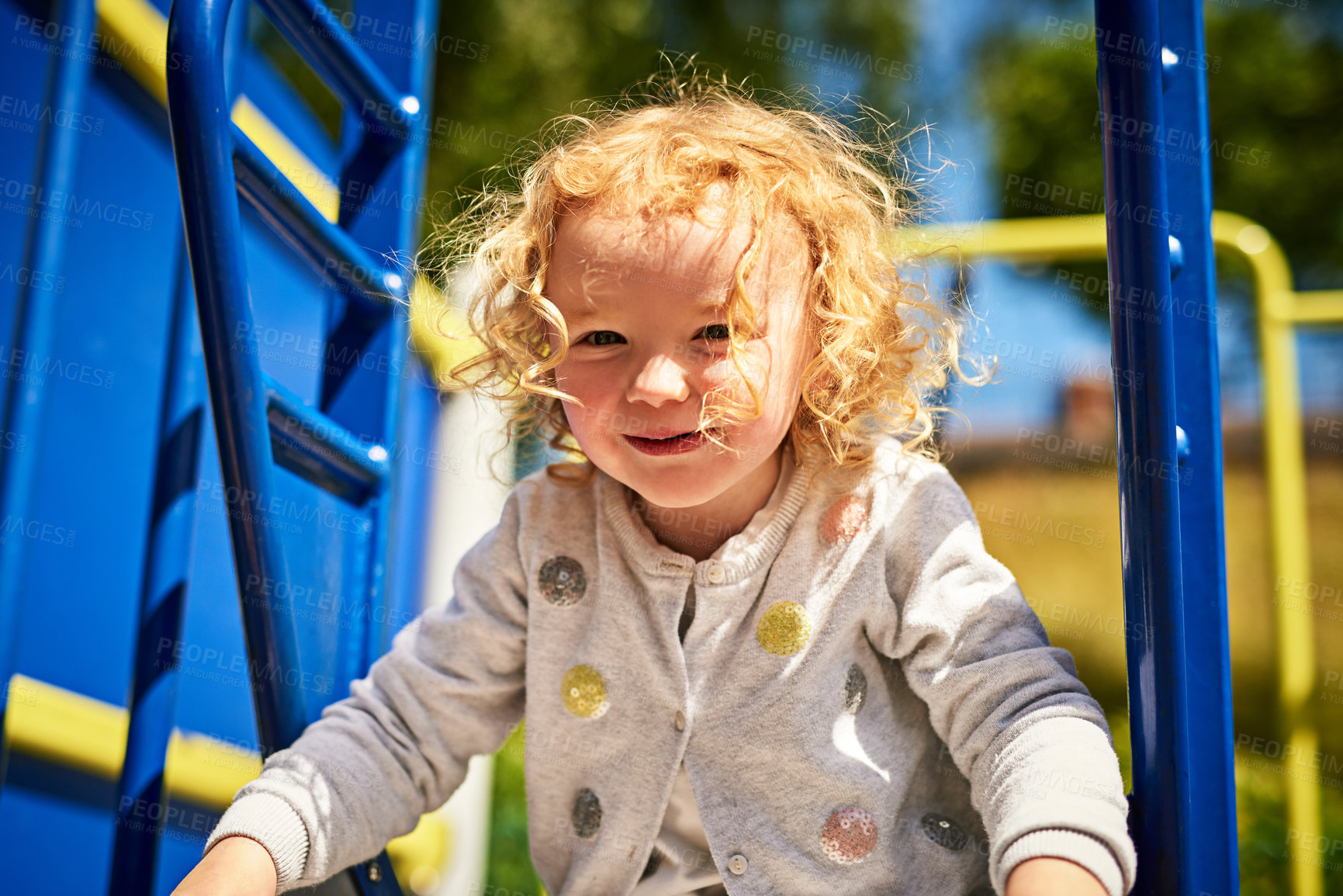 Buy stock photo Portrait, smile and swing with girl child on playground for fun, games or recreation at school. Education, face and happy with adorable kid outdoor for development, growth or recess in summer