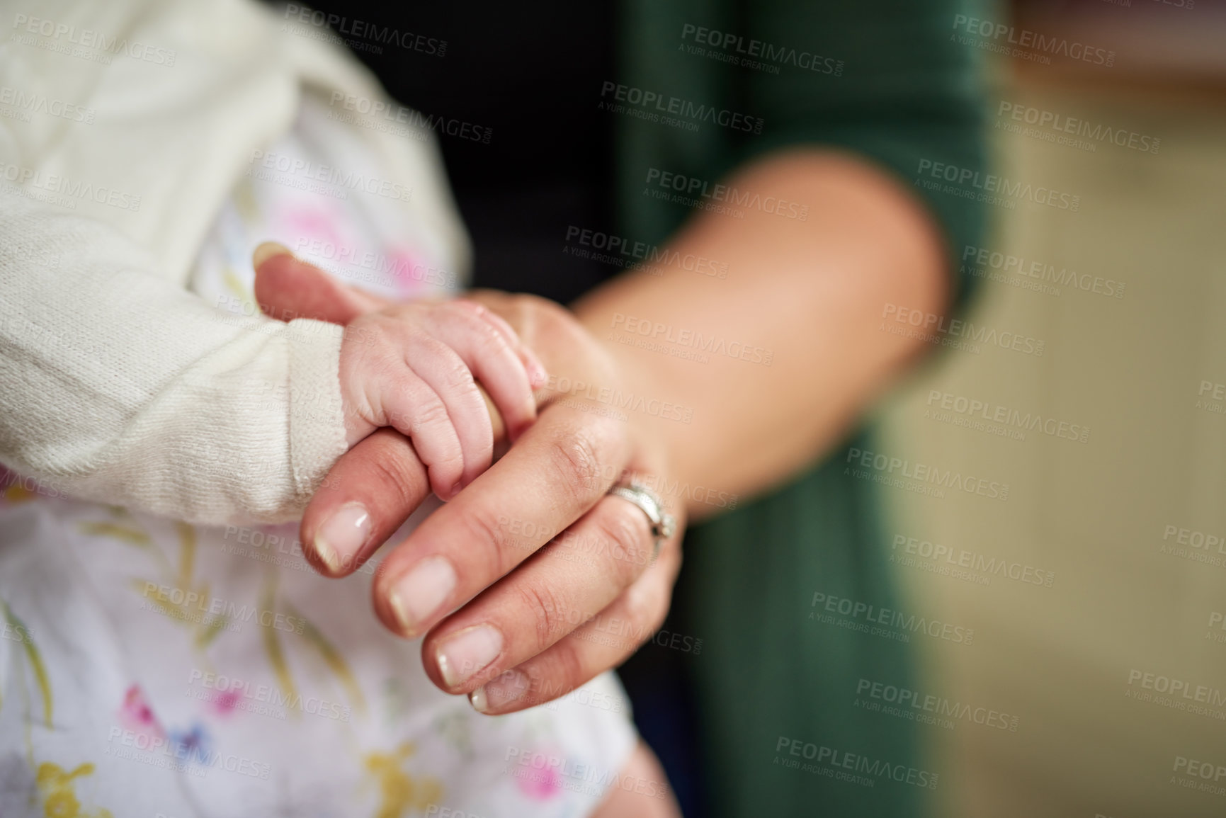 Buy stock photo Closeup, hands and parent with baby for care, bonding and connection to provide comfort with security. Family home, person and child with development for growth, support and mother for protection