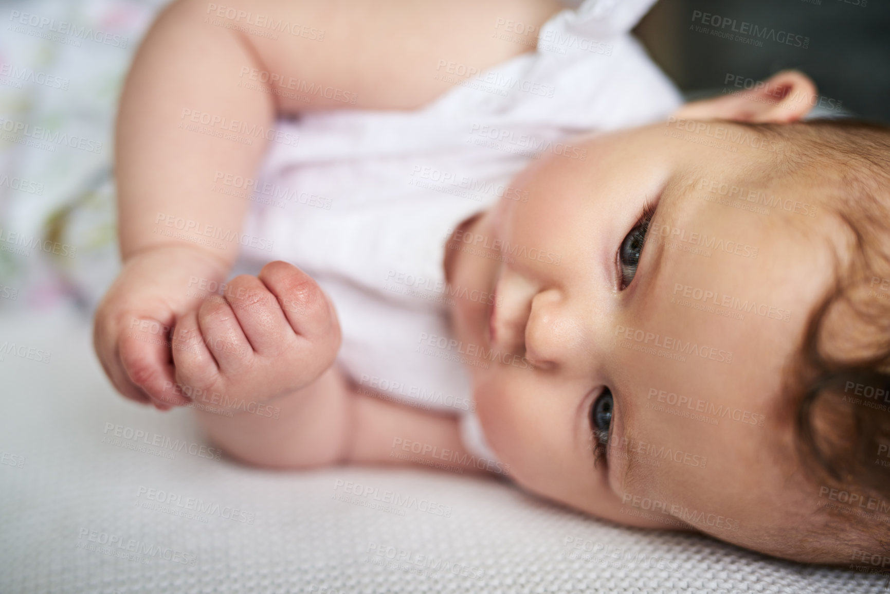 Buy stock photo Relax, cute and baby on bed in home for comfortable, development and resting in nursery on weekend. Adorable, sweet and little infant laying in morning for childhood, growth and peace in house