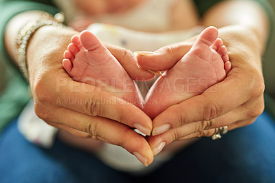 Buy stock photo Baby feet, heart hands of mom in home for love, care or security in childcare. Closeup, newborn toes or fingers of mother in gesture for support, protection or family in apartment for safety or care