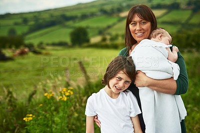 Buy stock photo Portrait, family and children with mother outdoor for love, care and travel together. Mom, kids and siblings with baby in countryside for support, connection and people on summer holiday in Ireland