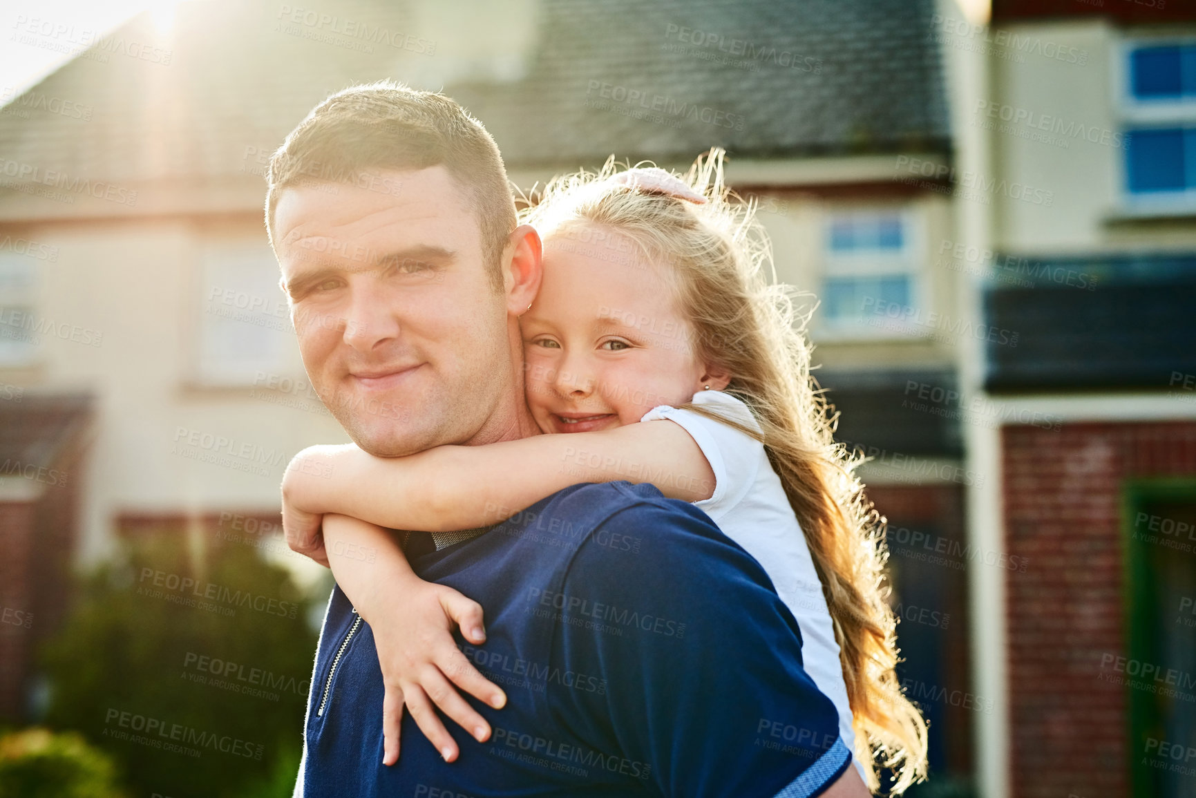 Buy stock photo Portrait, children and a piggyback girl with her dad in the backyard of their home together for bonding. Face, kids and a playful man carrying his daughter outside in the garden during a summer day