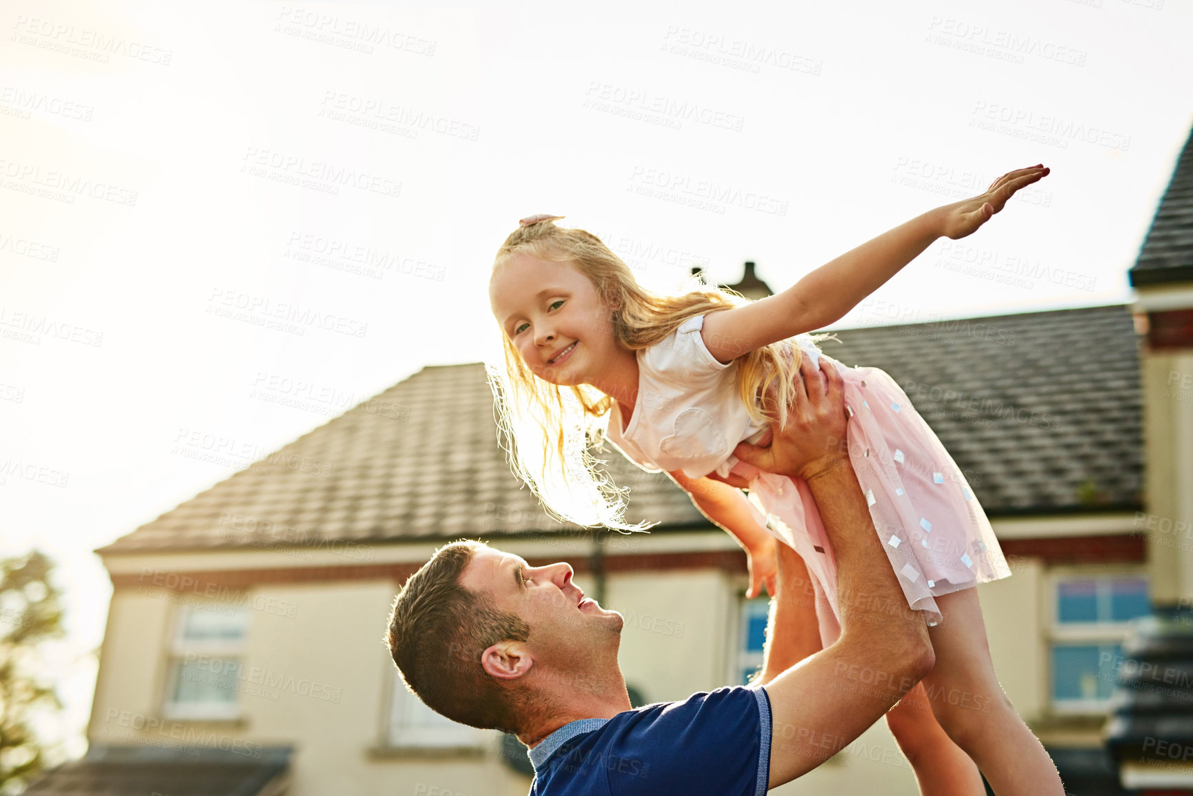 Buy stock photo Father, girl and outdoor flying portrait on weekend, lifting child and balance support for bonding. Dad, daughter and pretend airplane fantasy for imagination, parent and playing in backyard of home