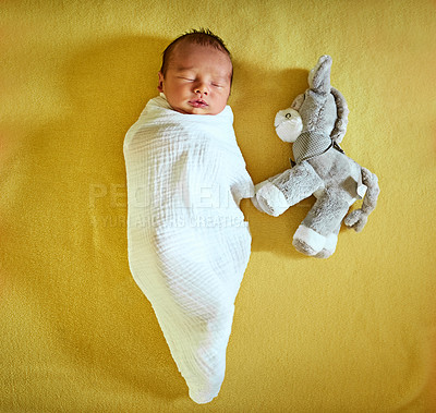 Buy stock photo Sleeping, toy and above of baby on yellow background for child development, wellness and growth. Adorable, cute and newborn resting, tired and nap for comfort, dreaming and blanket in nursery