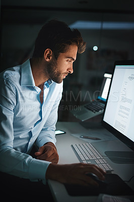 Buy stock photo Reading, thinking and businessman by computer for email, internet and working late in office for corporate career. Happiness, desk and lawyer with technology for communication in workspace at night