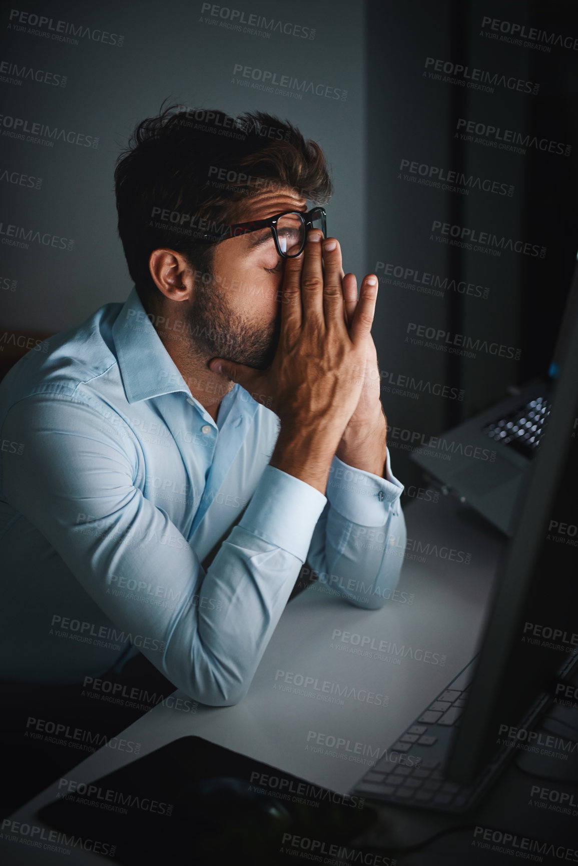 Buy stock photo Stress, night and a businessman with a headache at work, deadline burnout and frustrated. Sad, problem and a corporate employee in a dark office with anxiety or depression from an email on a pc