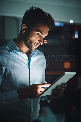 Buy stock photo Businessman, night and reading with tablet for research, networking or checking connectivity at office. Man, employee or tech support working late on technology for browsing or internet connection