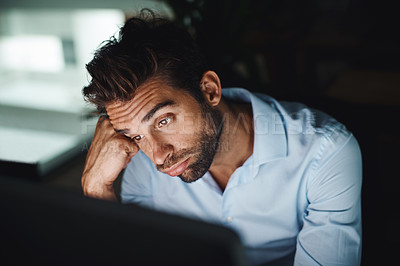 Buy stock photo Man, tired and bored with computer at night for coding, programming and software development at office. Business fatigue, working late for information technology and engineer with burnout in dark