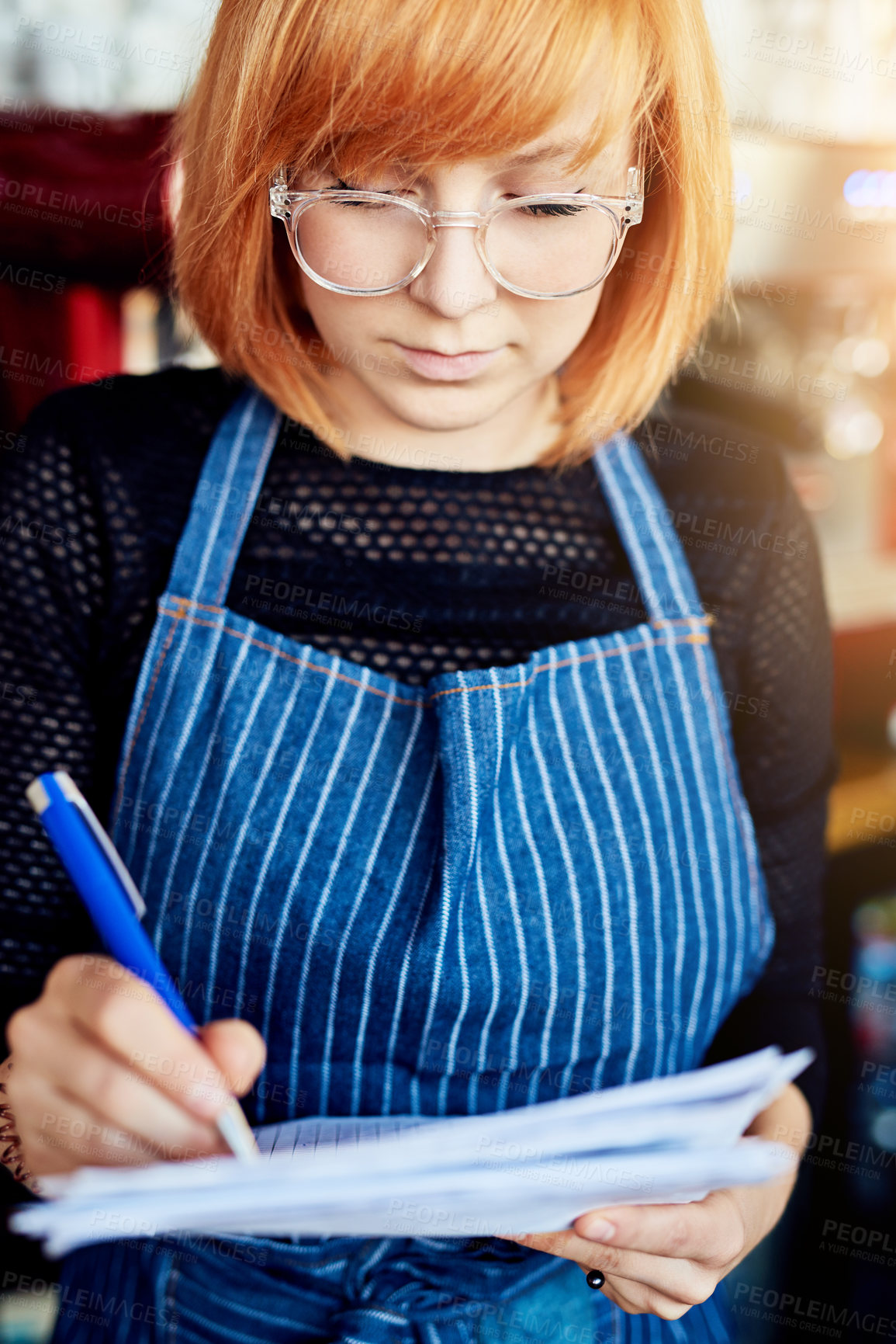 Buy stock photo Woman, startup and writing in cafe for checklist, stock control and feedback in coffee shop. Restaurant manager, female barista and notebook with pen for schedule, document and inventory in deli