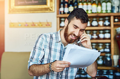 Buy stock photo Man, phone call and shop owner in restaurant with documents, thinking or negotiation for price, smile and deal. Barista, smartphone and paperwork for invoice, inventory and contact supplier in cafe