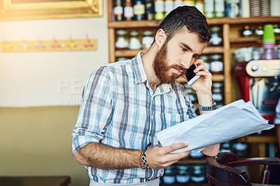 Buy stock photo Man, phone call and owner at coffee shop with paperwork, thinking or negotiation for price, stress and delay. Person, smartphone and documents for invoice, inventory and contact supplier at cafeteria