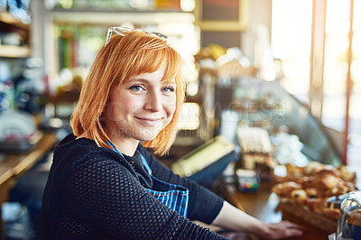 Buy stock photo Portrait of a confident young woman woman working in a coffee shop