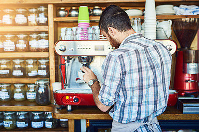 Buy stock photo Coffee, machine and man in cafe with cup for morning drink, wellness and service at small business. Relax, hospitality and barista in restaurant with espresso, latte or cappuccino process from back