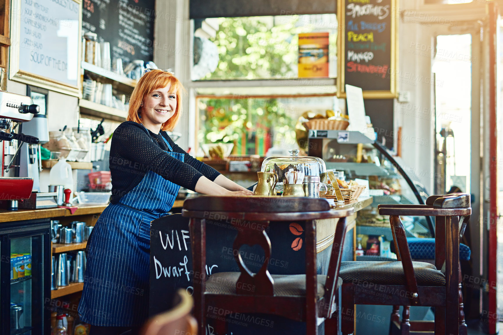 Buy stock photo Portrait, waiter or woman by counter in cafe, customer service and cashier working in coffee shop. Bistro startup, small business and female owner with smile for store management, serving or barista