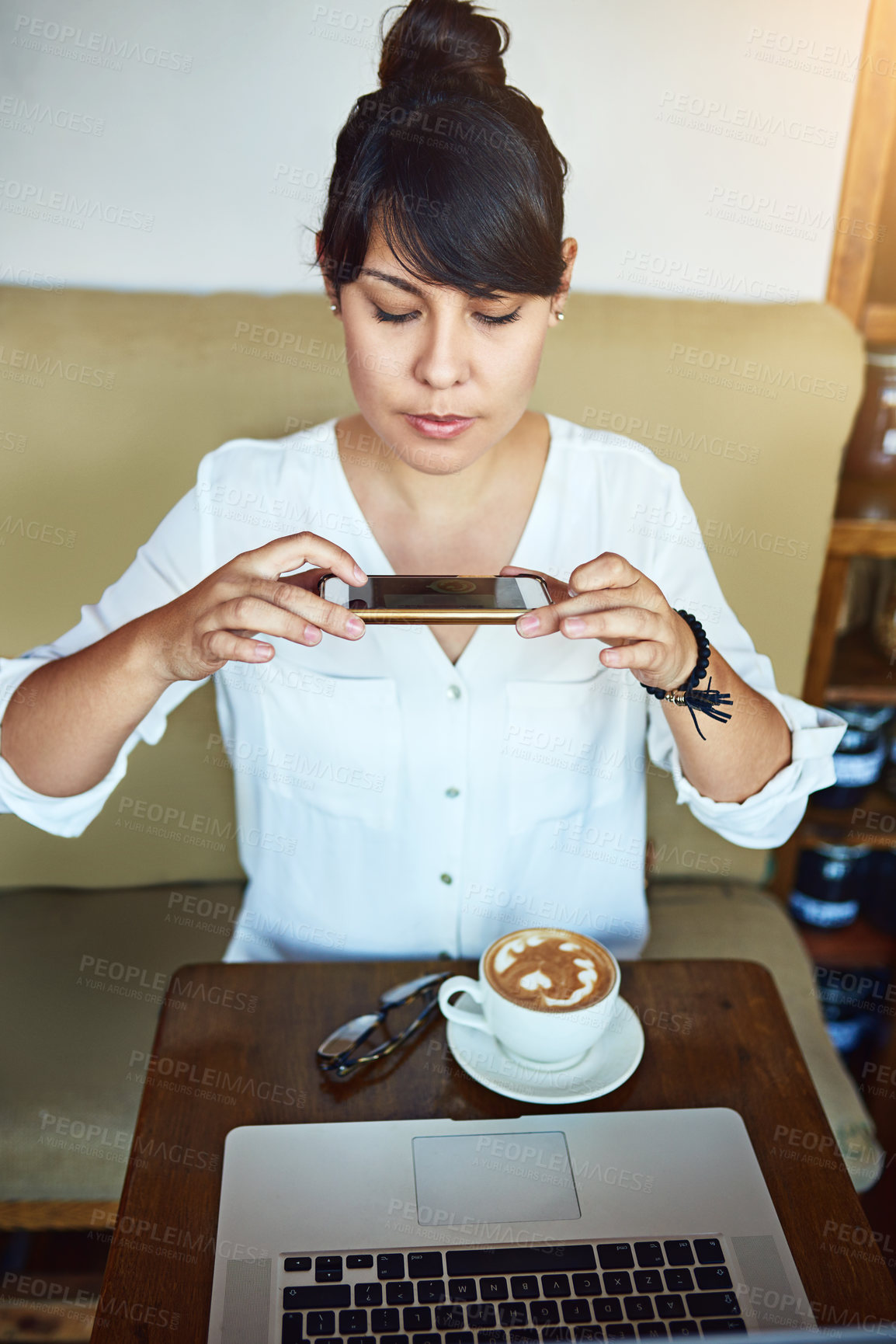 Buy stock photo Coffee, woman and picture in cafe, smartphone and small business with laptop, client and aroma. Person, customer and girl with cellphone, scent and keyboard with memory, digital app and cappuccino