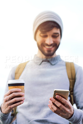 Buy stock photo Hands, phone and happy student with coffee outdoor, scroll or text message for education. Drink, man and mobile at university campus for internet, social media and reading test results in low angle