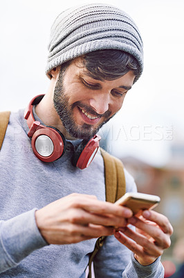 Buy stock photo Smile, backpack and man with smartphone in city for travel, communication and navigation info. Happy, male person and headphones with tech for outdoor journey, online update and tourism in New York