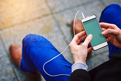 Buy stock photo Man, screen and hands with smartphone or above, music listening and podcast or radio tech with display outside. Online, connectivity and communication for notification message, social media and blog