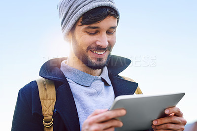 Buy stock photo Student, man and smile at tablet for social media, update and search on internet. Comedy, happy and male person outside with technology for video, communication and networking with app or website