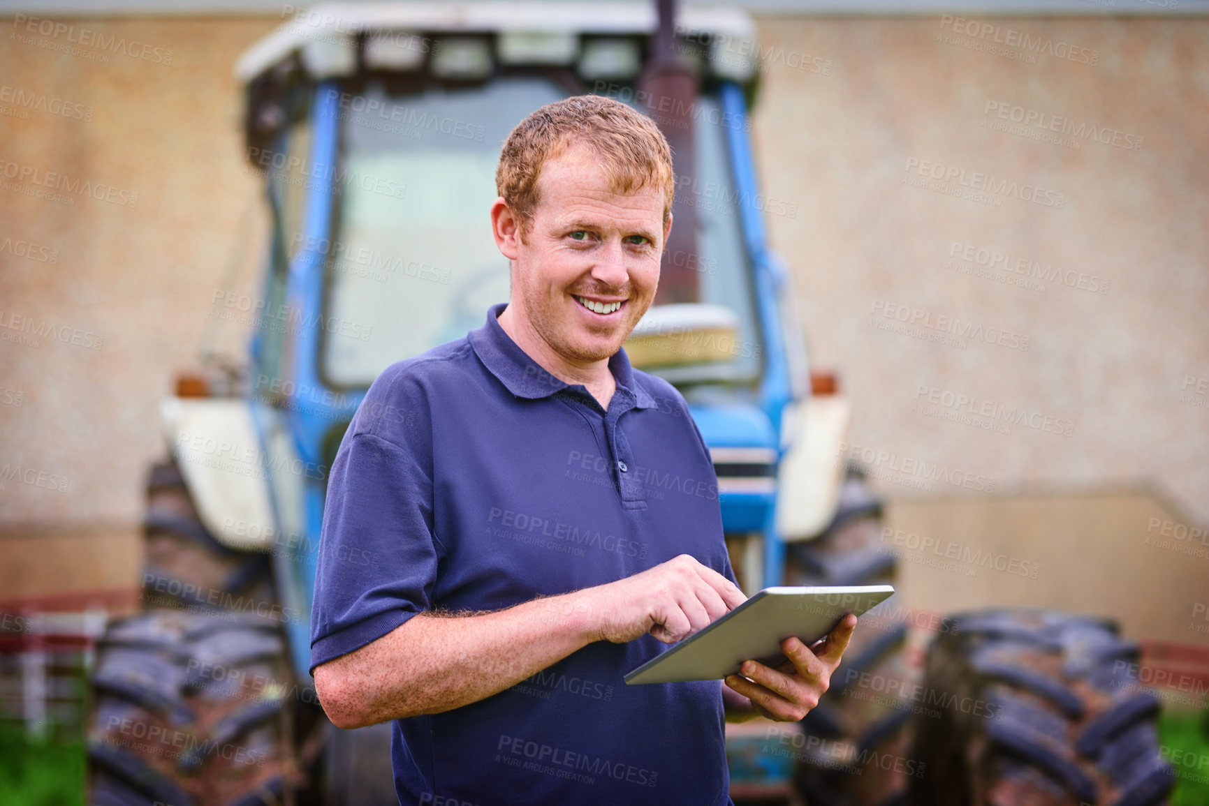 Buy stock photo Farming, portrait and man with tablet by tractor for production, schedule and research on weather. Happy, farmer and male person with technology for agriculture, information and update on industry