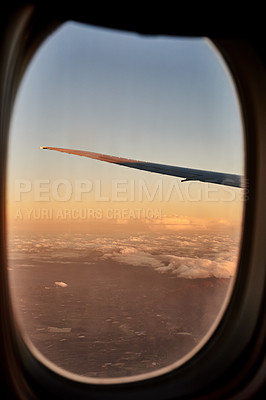 Buy stock photo Cropped shot of the views from an airplane window