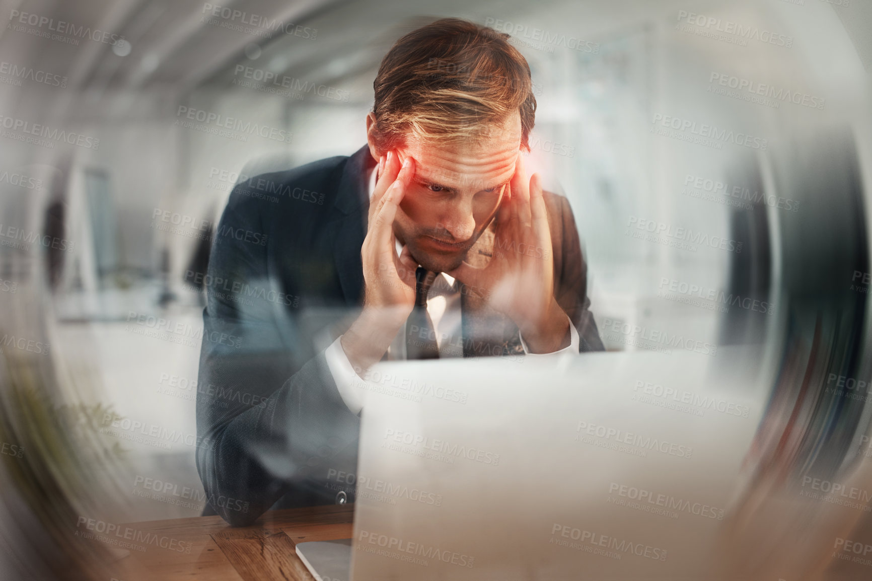 Buy stock photo Laptop, blur and business man with headache, stress and deadline at night in office. Pain, sick and tired employee with migraine on computer, vertigo and massage temples for brain fog with red glow