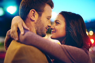 Buy stock photo Couple, night and hug outdoor with happiness, nose touch and bonding for romance and sweet moment. Love, affection and people in commitment and trust, security and support together with time together