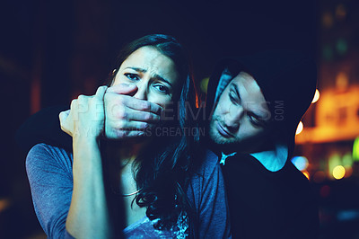 Buy stock photo Woman, criminal and hand on mouth with terror for violence, danger and robbery in city at night with bokeh. People, portrait and silence emoji with fear, crime and gangster for kidnapping and hostage