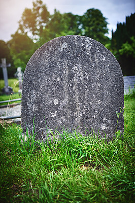 Buy stock photo Tombstone, grass and cemetery for peace, funeral and memory or empty space outdoor. Death, old headstone and graveyard for history, burial site and legacy for traditional culture on land in Ireland